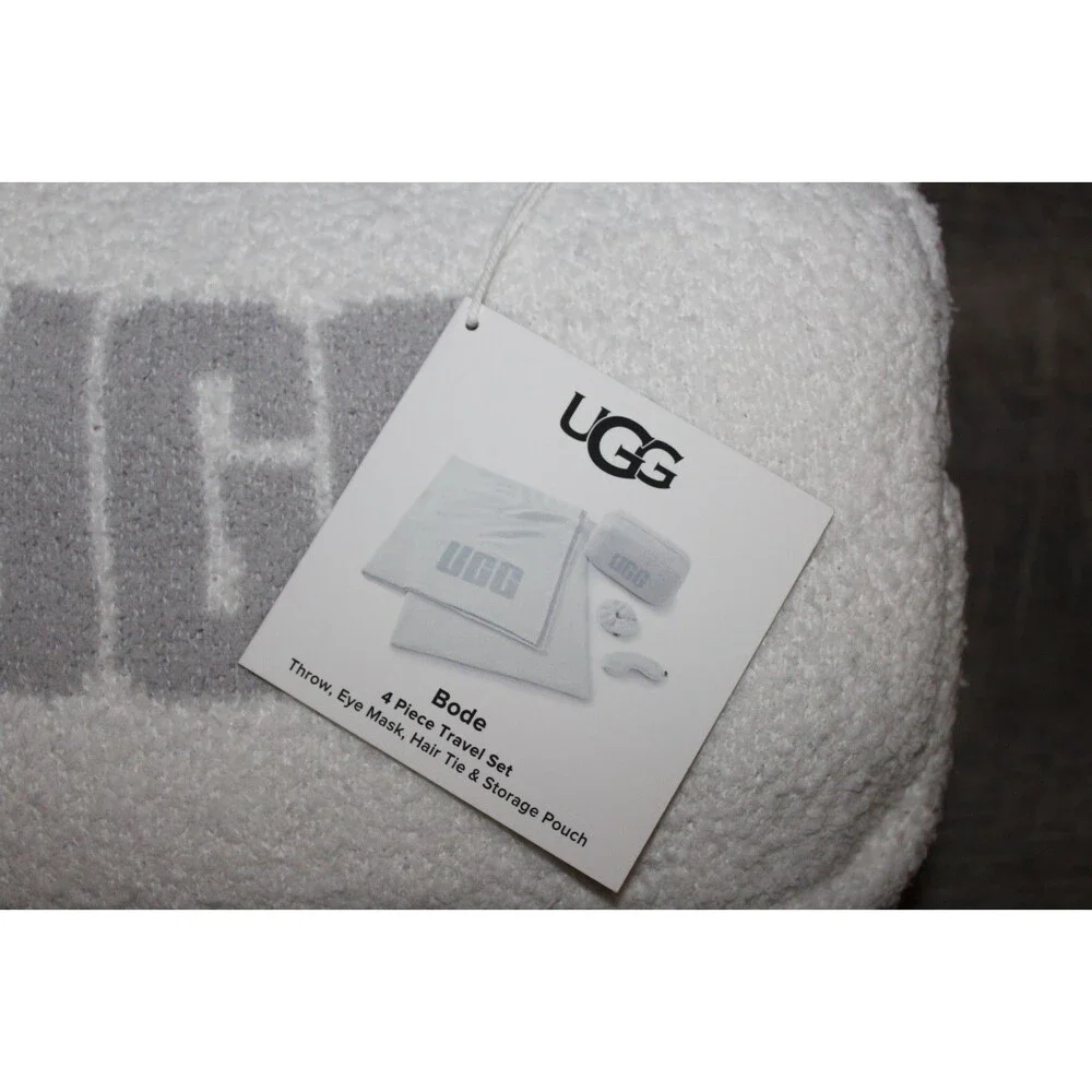 UGG 4 PIECE TRAVEL SET WHITE THROW EYE MAKE HAIR TYE AND STORAGE PURSE
